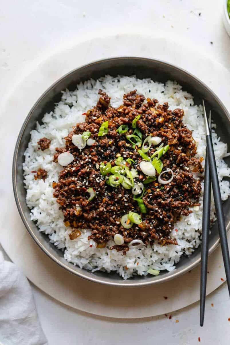 Korean beef is as simple as dinner gets! Comes together in less than 25 minutes and has so much amazing Asian flavor!