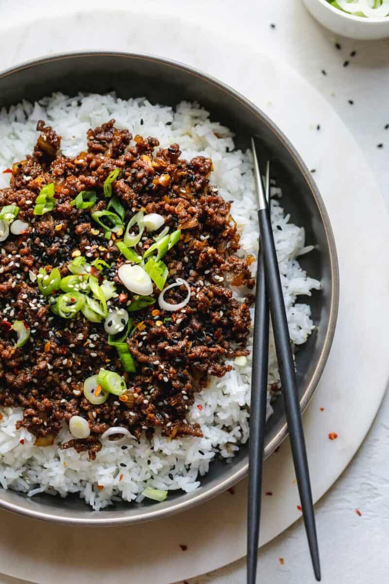 Korean beef is as simple as dinner gets! Comes together in less than 25 minutes and has so much amazing Asian flavor!