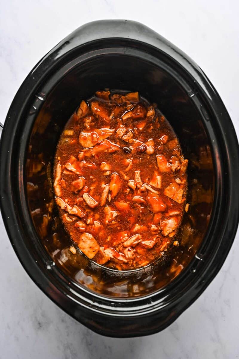 Finished honey sesame chicken in the crockpot.