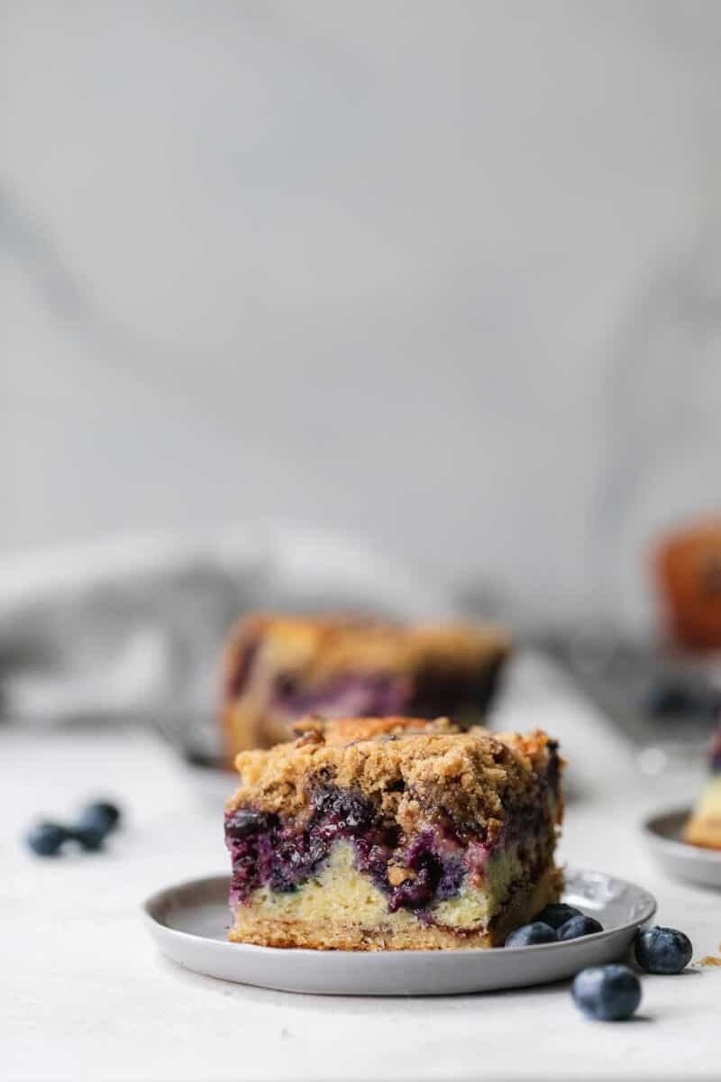 This blueberry coffee cake is tender, moist, and bursting with fresh summer blueberries! The perfect pairing with your coffee or afternoon tea!