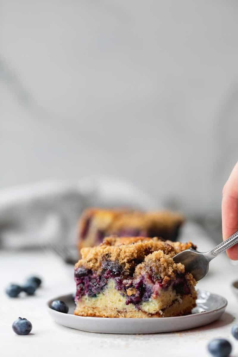 This blueberry coffee cake is tender, moist, and bursting with fresh summer blueberries! The perfect pairing with your coffee or afternoon tea!