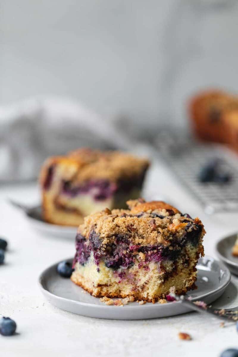 This blueberry coffee cake is tender, moist, and bursting with fresh summer blueberries! The perfect pairing with your coffee or afternoon tea!