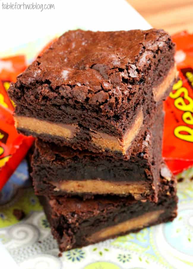 These Reese’s Cup brownies are a great way to use up leftover Halloween candy. Or a great excuse to buy some candy.