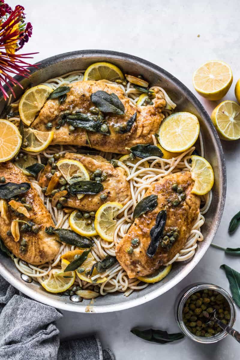 This easy chicken piccata is elevated with a crispy sage and garlic brown butter sauce! Still, it only takes less than an hour to put this gorgeous dish together for dinner!