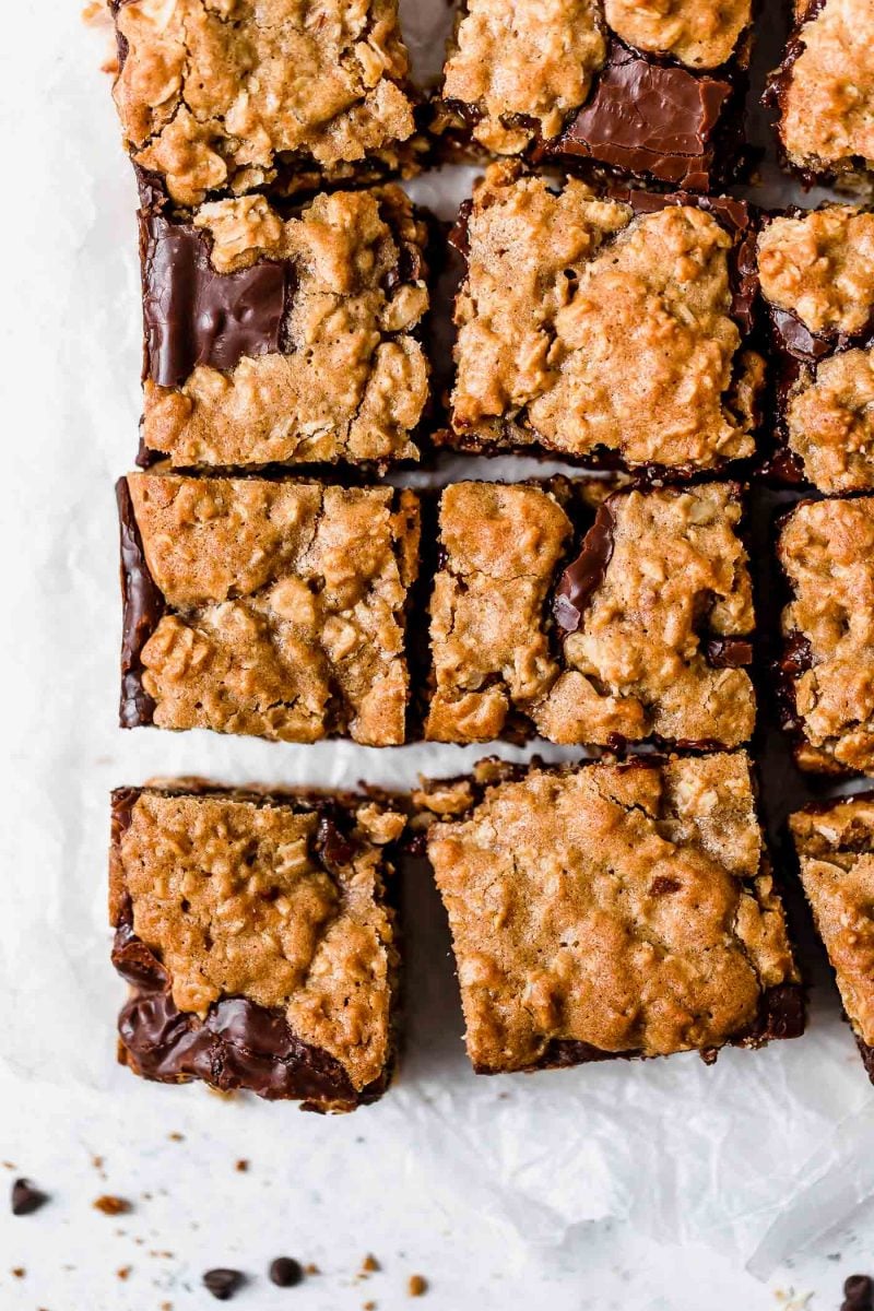 These oatmeal and chocolate cookie bars are a result of an oatmeal cookie having a baby with a chocolate cookie. So freaking good!!