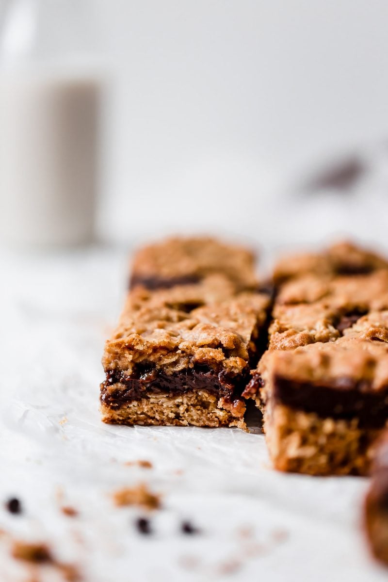 These oatmeal and chocolate cookie bars are a result of an oatmeal cookie having a baby with a chocolate cookie. So freaking good!!