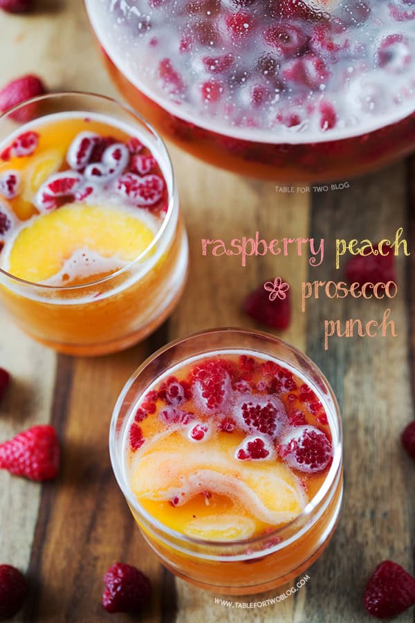 Raspberry Peach Prosecco Punch | www.tablefortwoblog.com Raspberry Peach Prosecco Punch | www.tablefortwoblog.com