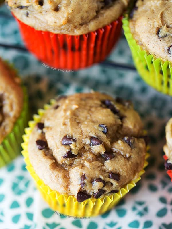 Banana Peanut Butter Chocolate Chip Muffins are the perfect way to use up extra bananas! Recipe on tablefortwoblog.com