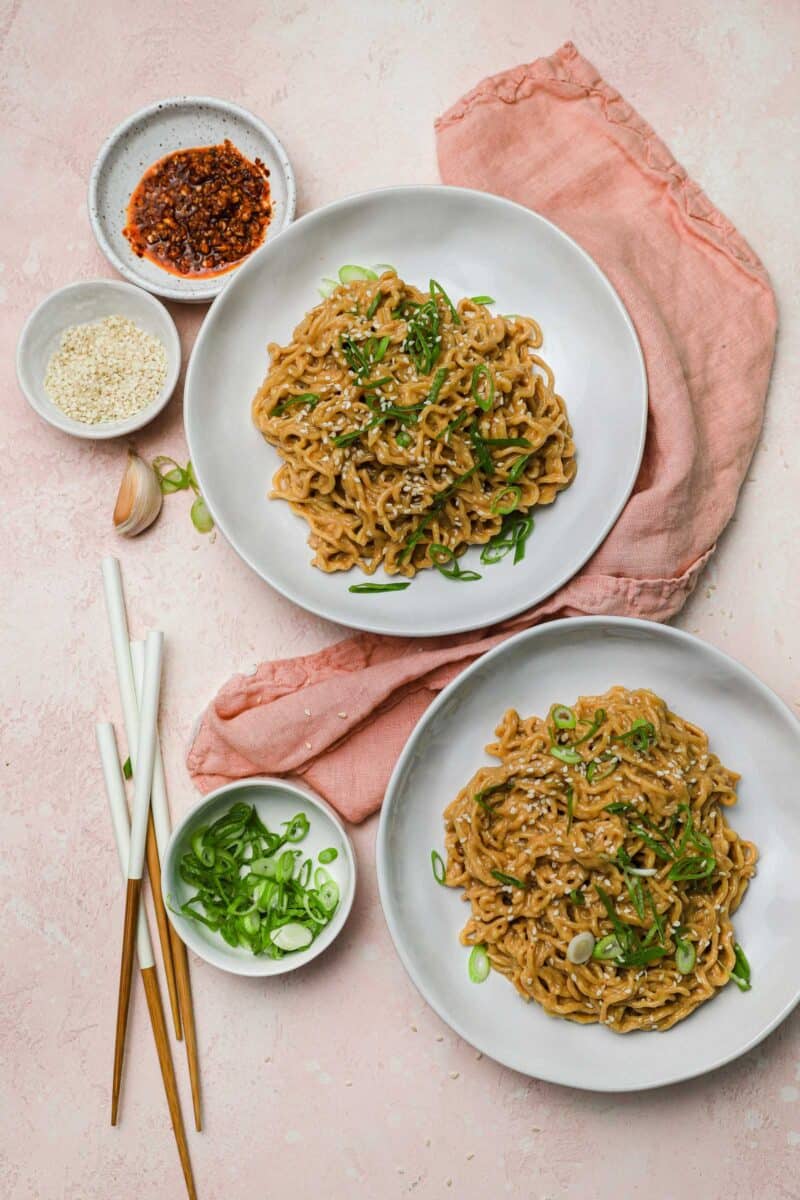 These cold spicy peanut sesame noodles are nostalgic because it reminds me of childhood and my mother's intricate school lunches. Spicy peanut sesame noodles are served cold so they're incredibly refreshing on a warm day!