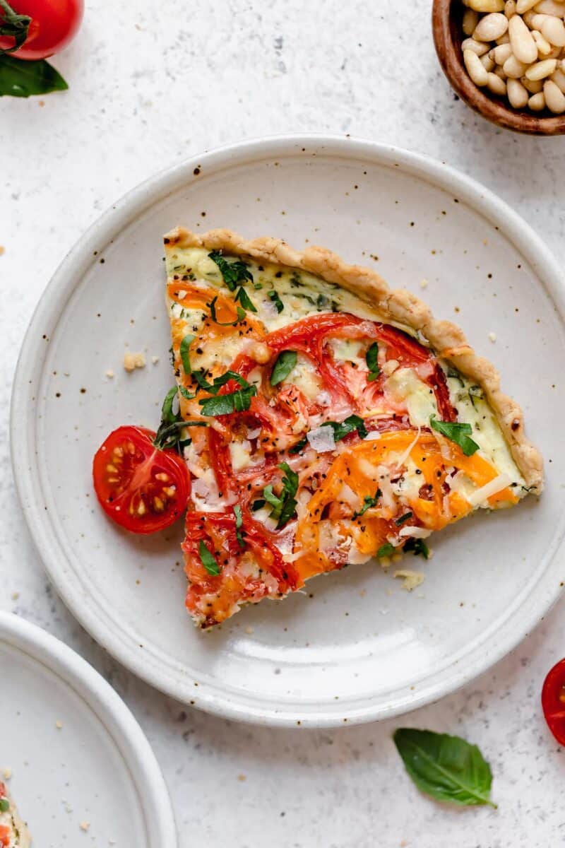 This gorgeous tomato ricotta tart uses up all your summer's freshest tomatoes! Just another way to eat up all of summer!