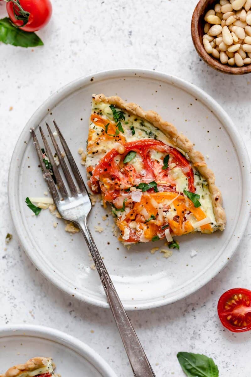 This gorgeous tomato ricotta tart uses up all your summer's freshest tomatoes! Just another way to eat up all of summer!