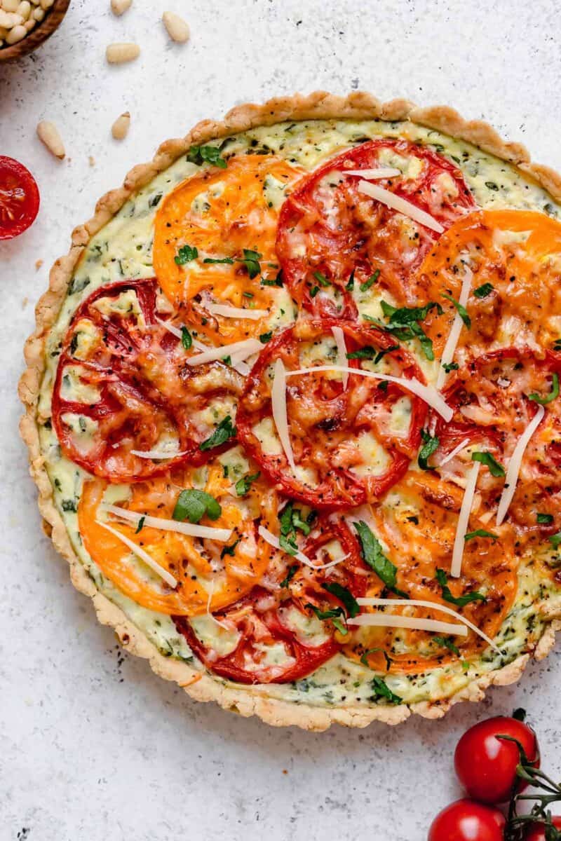This gorgeous tomato ricotta tart uses up all your summer's freshest tomatoes! Just another way to eat up all of summer!