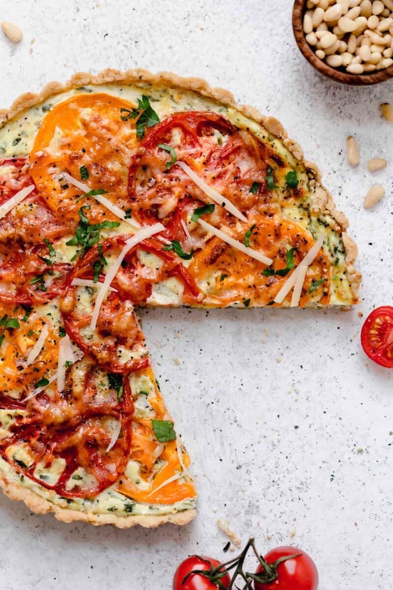 This gorgeous tomato ricotta tart uses up all your summer's freshest tomatoes! Just another way to eat up all of summer!