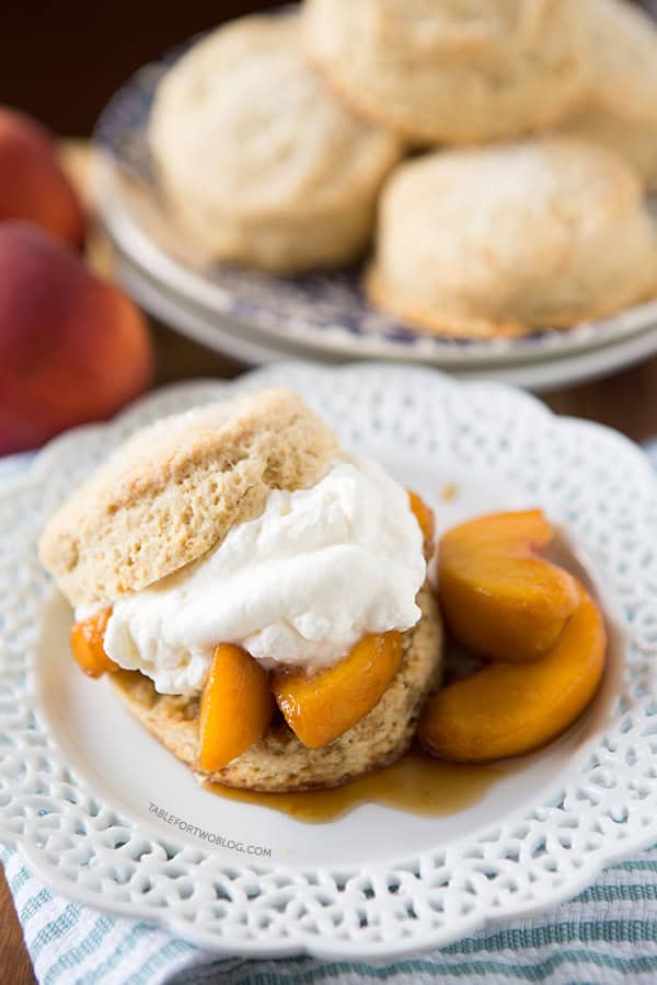 Boozy Peaches and Honey Cream Shortcakes | tablefortwoblog.com