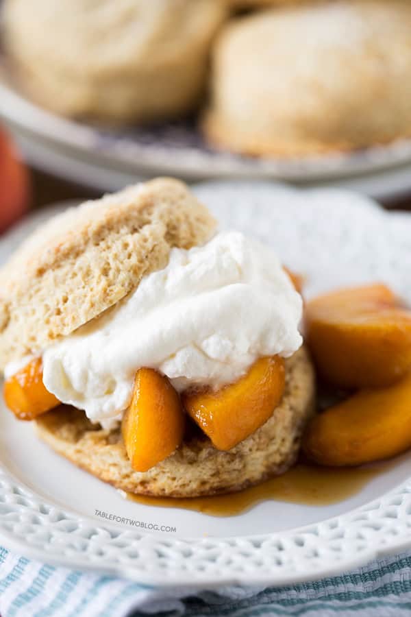 Boozy Peaches and Honey Cream Shortcakes | tablefortwoblog.com