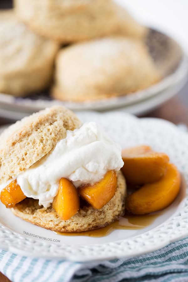 Boozy Peaches and Honey Cream Shortcakes | tablefortwoblog.com