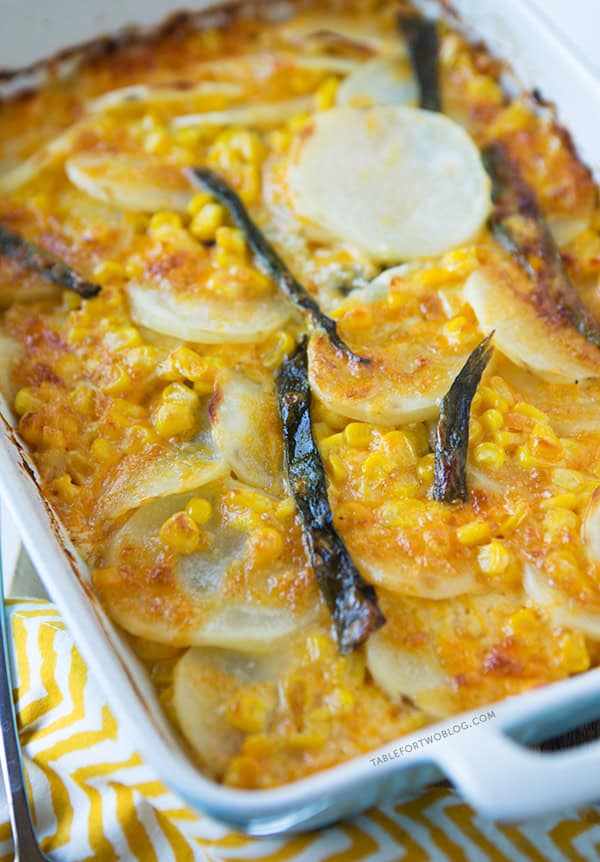 Poblano Potato Gratin is a unique #Thanksgiving side dish that's full of flavor and easy to put together! Recipe on tablefortwoblog.com