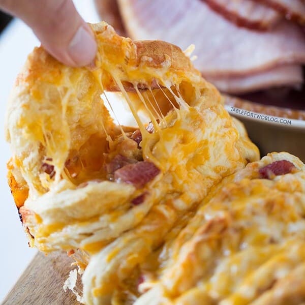 Ham and cheese pull apart bread is so easy to make for a crowd! Recipe on tablefortwoblog.com