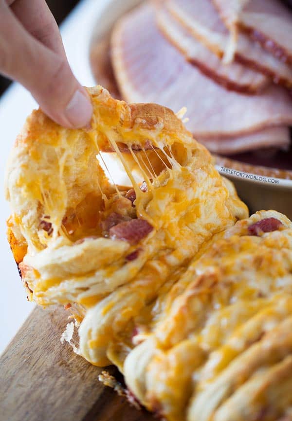 Ham and cheese pull apart bread is so easy to make for a crowd! Recipe on tablefortwoblog.com