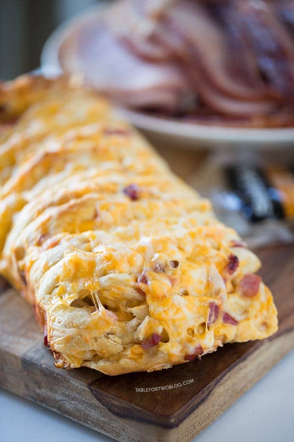 Ham and cheese pull apart bread is so easy to make for a crowd! Recipe on tablefortwoblog.com
