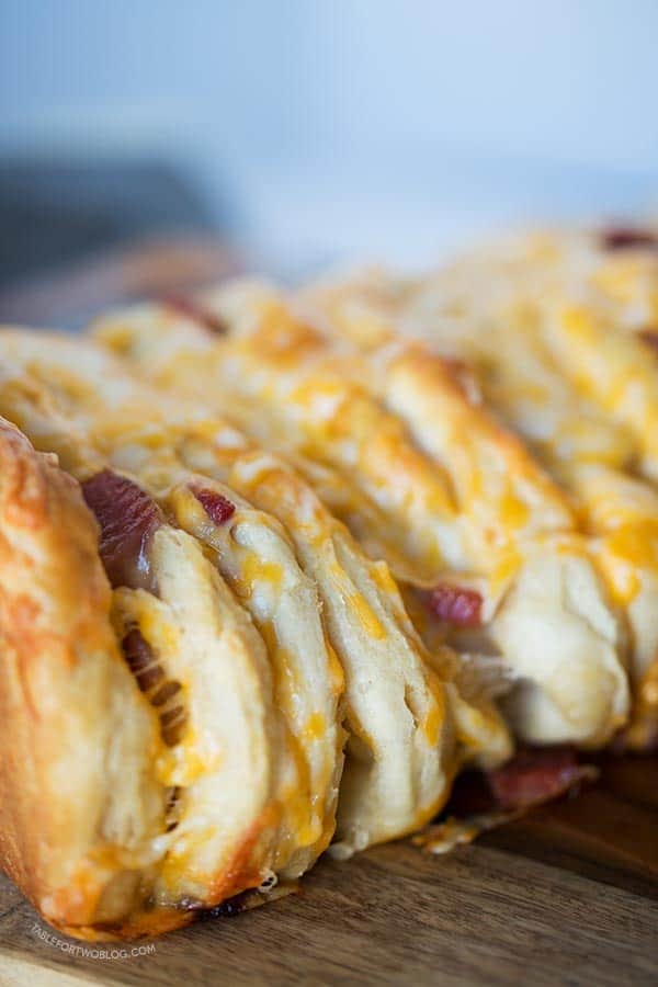 Ham and cheese pull apart bread is so easy to make for a crowd! Recipe on tablefortwoblog.com