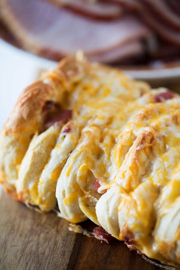 Ham and cheese pull apart bread is so easy to make for a crowd! Recipe on tablefortwoblog.com