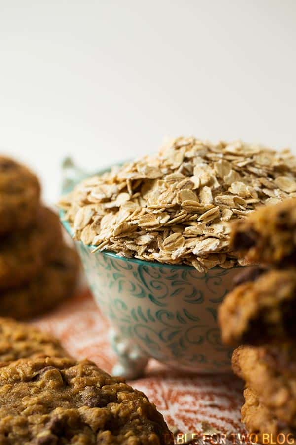 The chewiest and slightly crisp honey oatmeal chocolate chip cookies! Recipe on tablefortwoblog.com