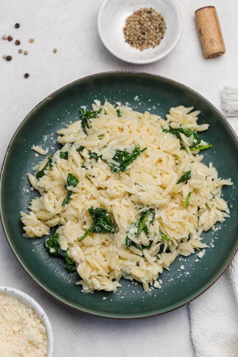 Classic parmesan and spinach goes so well together in this parmesan and spinach orzo! When you need an easy dinner that will satisfy all palettes, this will be the winner!