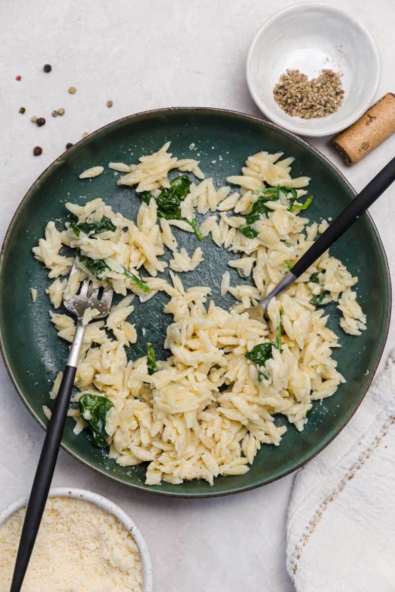 Classic parmesan and spinach goes so well together in this parmesan and spinach orzo! When you need an easy dinner that will satisfy all palettes, this will be the winner!