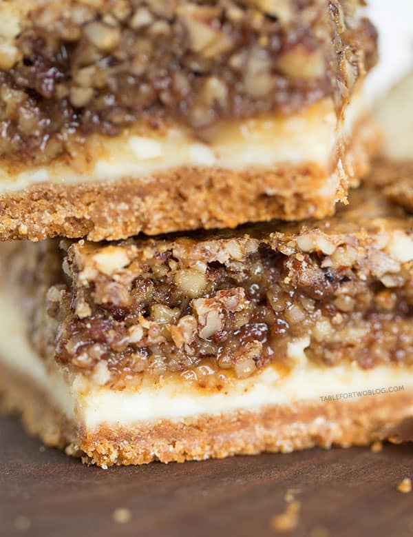 Hazelnut pecan cheesecake bars is a decadent treat perfect for sharing! Recipe on tablefortwoblog.com