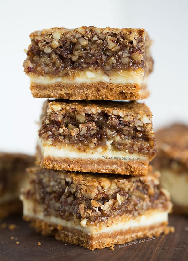 Hazelnut pecan cheesecake bars is a decadent treat perfect for sharing! Recipe on tablefortwoblog.com