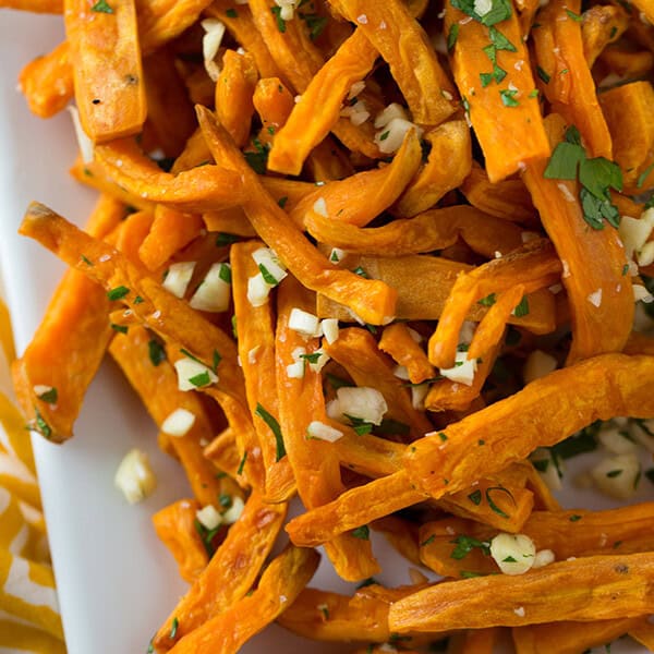 These baked garlic sweet potato fries are a great side dish for any burger or whenever the craving hits!