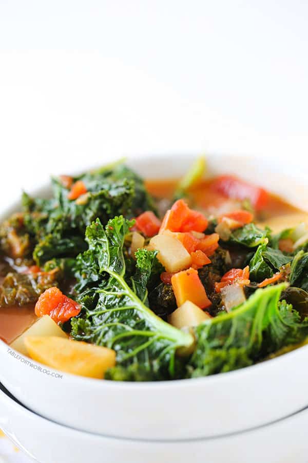 Tomato, kale, and potato soup is a perfectly hearty and healthy soup that is chock full of veggies!