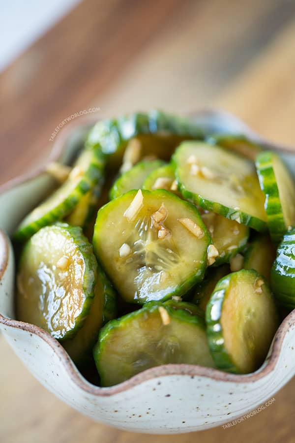 These chilled garlic soy cucumbers are a refreshing snack for any hot summer day! Make a batch to accompany your next summer meal!