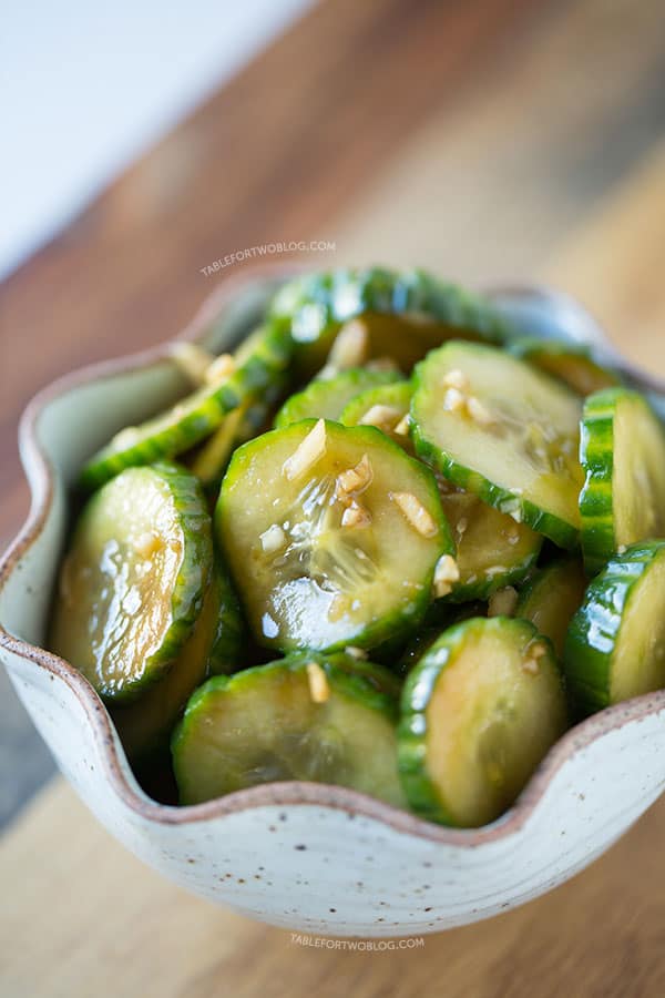 These chilled garlic soy cucumbers are a refreshing snack for any hot summer day! Make a batch to accompany your next summer meal!