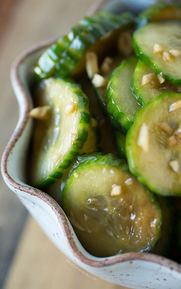These chilled garlic soy cucumbers are a refreshing snack for any hot summer day! Make a batch to accompany your next summer meal!