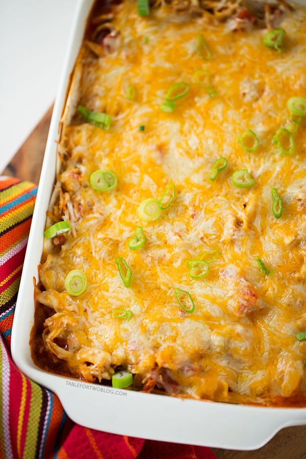 Stacked chicken enchiladas are the way to go if you're craving Mexican and don't want all the prep time that's involved in regular enchiladas!