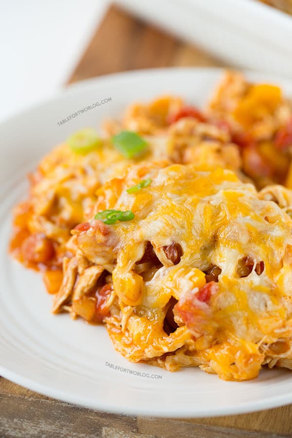 Stacked chicken enchiladas are the way to go if you're craving Mexican and don't want all the prep time that's involved in regular enchiladas!