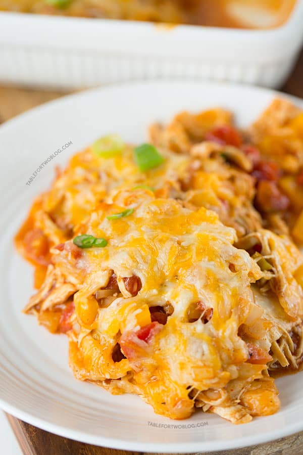 Stacked chicken enchiladas are the way to go if you're craving Mexican and don't want all the prep time that's involved in regular enchiladas!