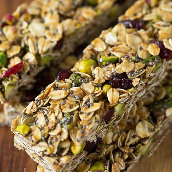 Make a batch of these cranberry pistachio granola bars to take as a snack to the beach, pool, or even plane ride for happy campers while traveling!