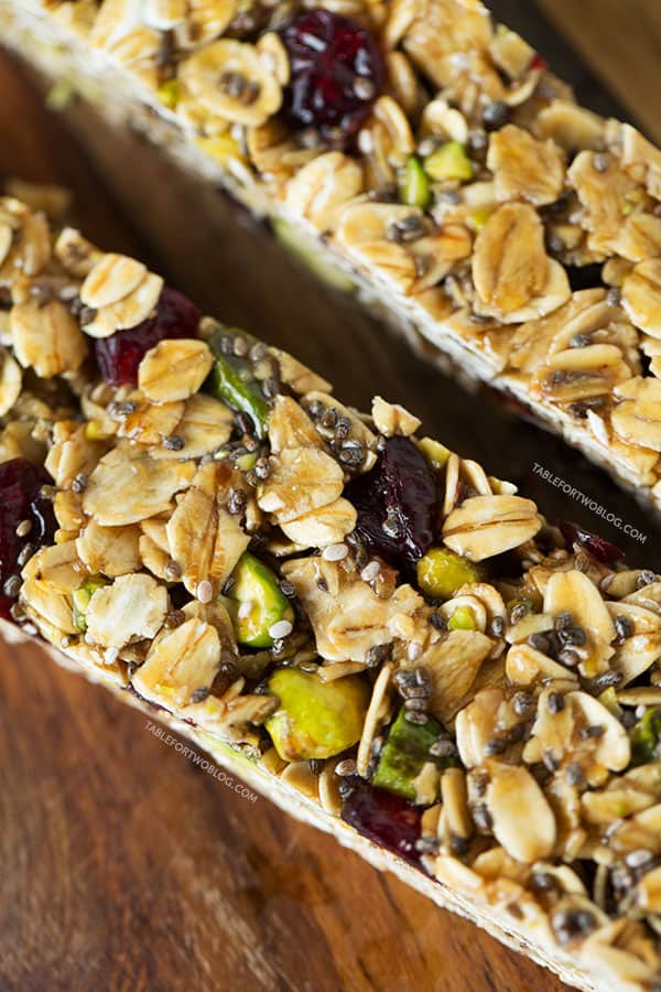 Make a batch of these cranberry pistachio granola bars to take as a snack to the beach, pool, or even plane ride for happy campers while traveling!