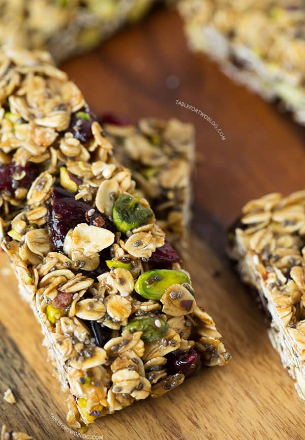 Make a batch of these cranberry pistachio granola bars to take as a snack to the beach, pool, or even plane ride for happy campers while traveling!