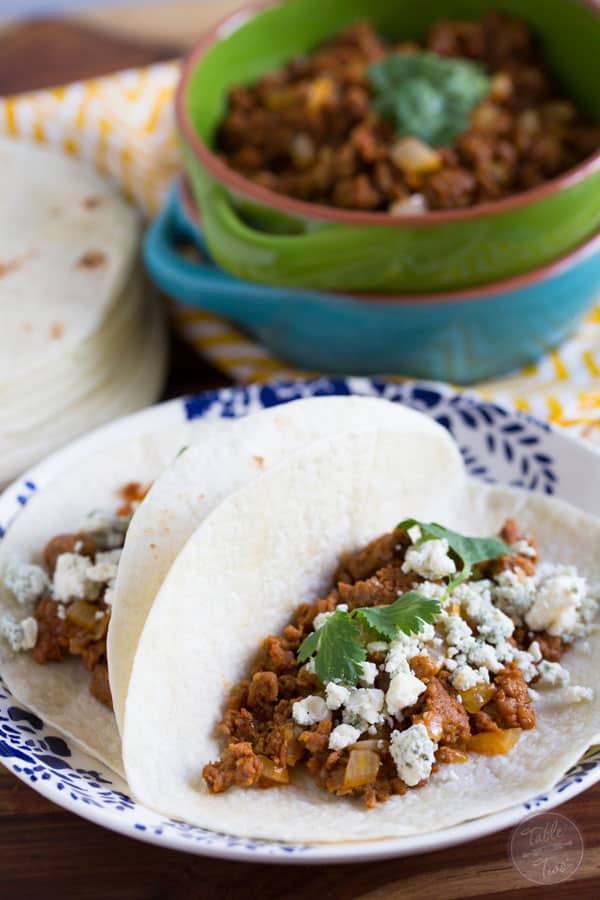 If you've never had blue cheese on tacos, you're missing out! It pairs perfectly with the spicy chorizo!