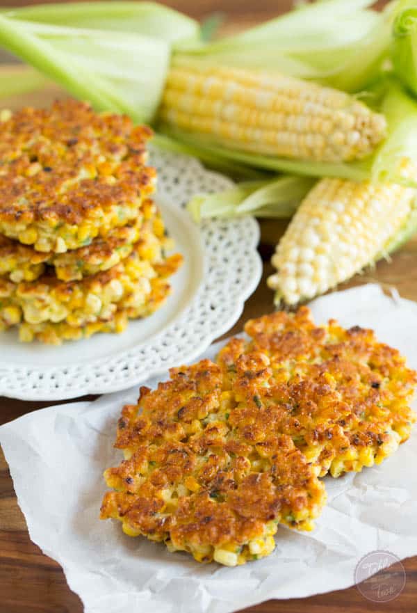 Grilled corn fritters are a great way to use your grilled corn! These little cakes are so easy to put together! Click for recipe.