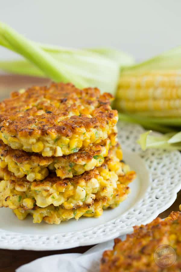 Grilled corn fritters are a great way to use your grilled corn! These little cakes are so easy to put together! Click for recipe.