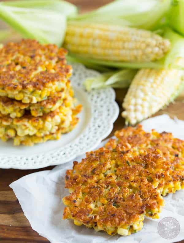 Grilled corn fritters are a great way to use your grilled corn! These little cakes are so easy to put together! Click for recipe.