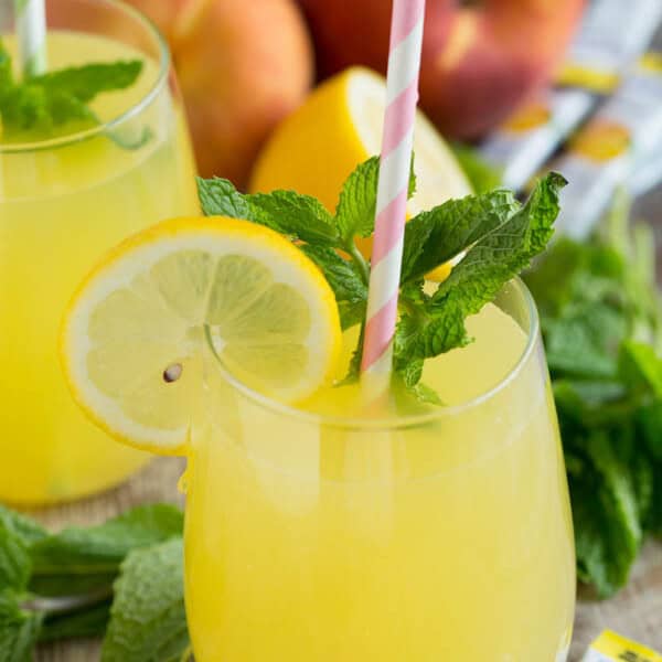 Sparkling Mint Peach Lemonade is refreshing, sweet, and full of bubbles! You'll want a large pitcher of this!