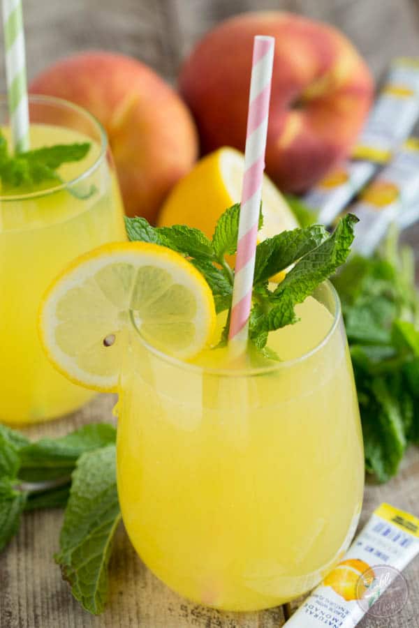 Sparkling Mint Peach Lemonade is refreshing, sweet, and full of bubbles! You'll want a large pitcher of this!