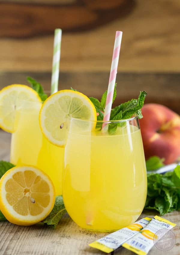Sparkling Mint Peach Lemonade is refreshing, sweet, and full of bubbles! You'll want a large pitcher of this!