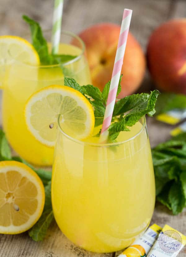 Sparkling Mint Peach Lemonade is refreshing, sweet, and full of bubbles! You'll want a large pitcher of this!